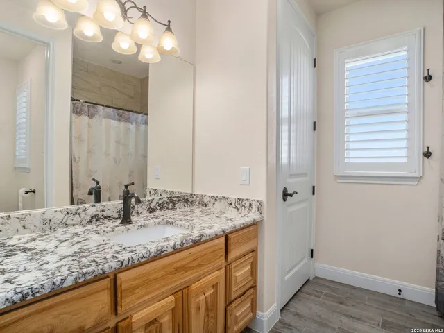 a room with furniture and gym equipment