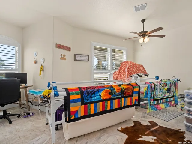 a bathroom with a sink a vanity and mirror