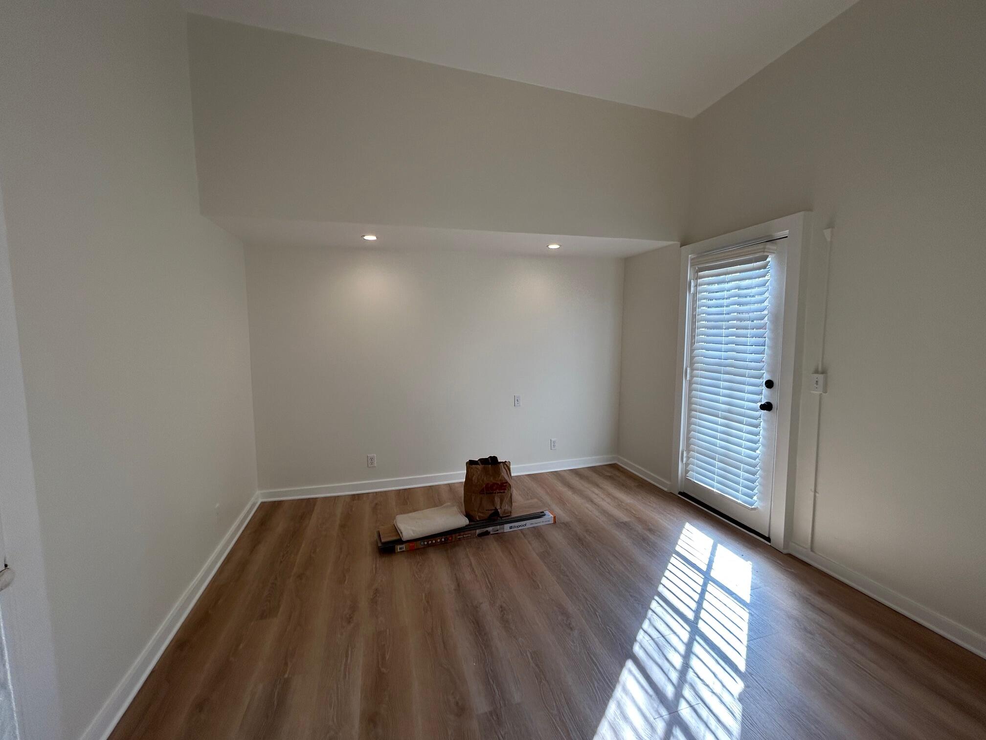 810 East Canon Perdido Street, Unit A Santa Barbara, CA 93103 - Photo 8 of 12 a view of room with wooden floor and window