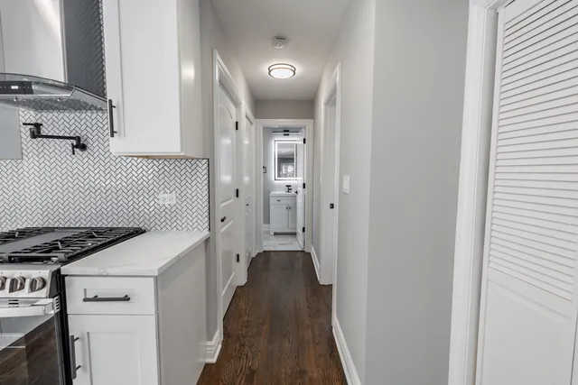a view of a hallway with closet