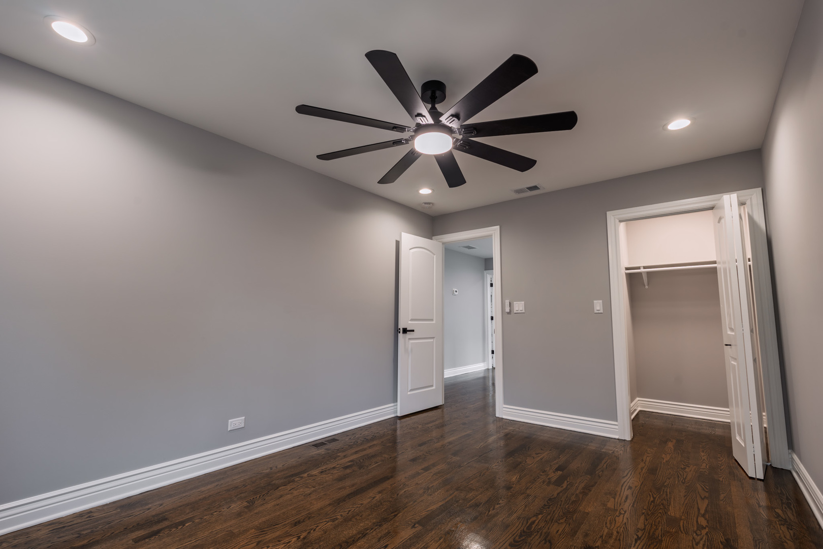 2252 Northgate Avenue North Riverside, IL 60546 - Photo 21 of 46 an empty room with wooden floor fan and windows