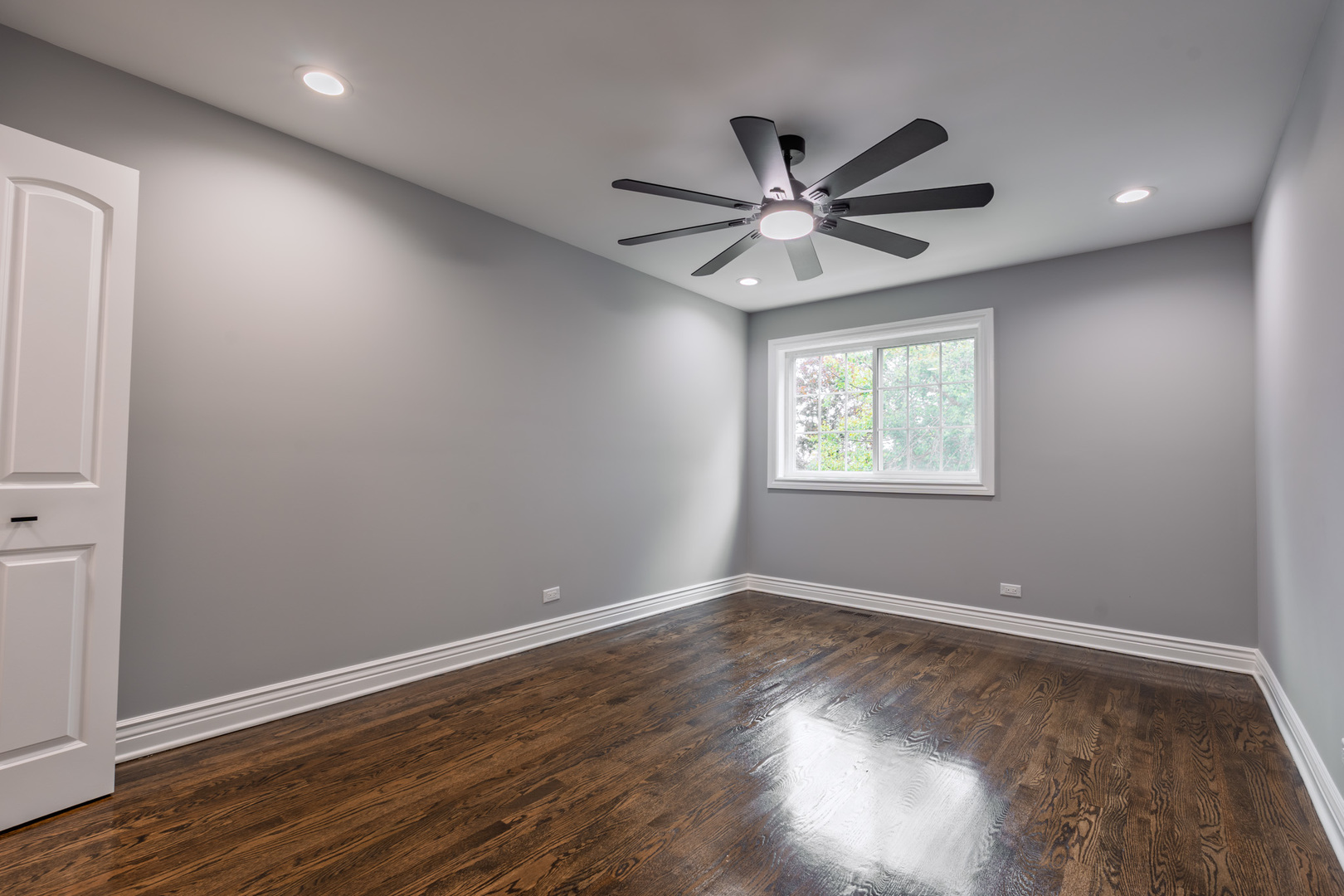 2252 Northgate Avenue North Riverside, IL 60546 - Photo 22 of 46 a view of an empty room with window and wooden floor