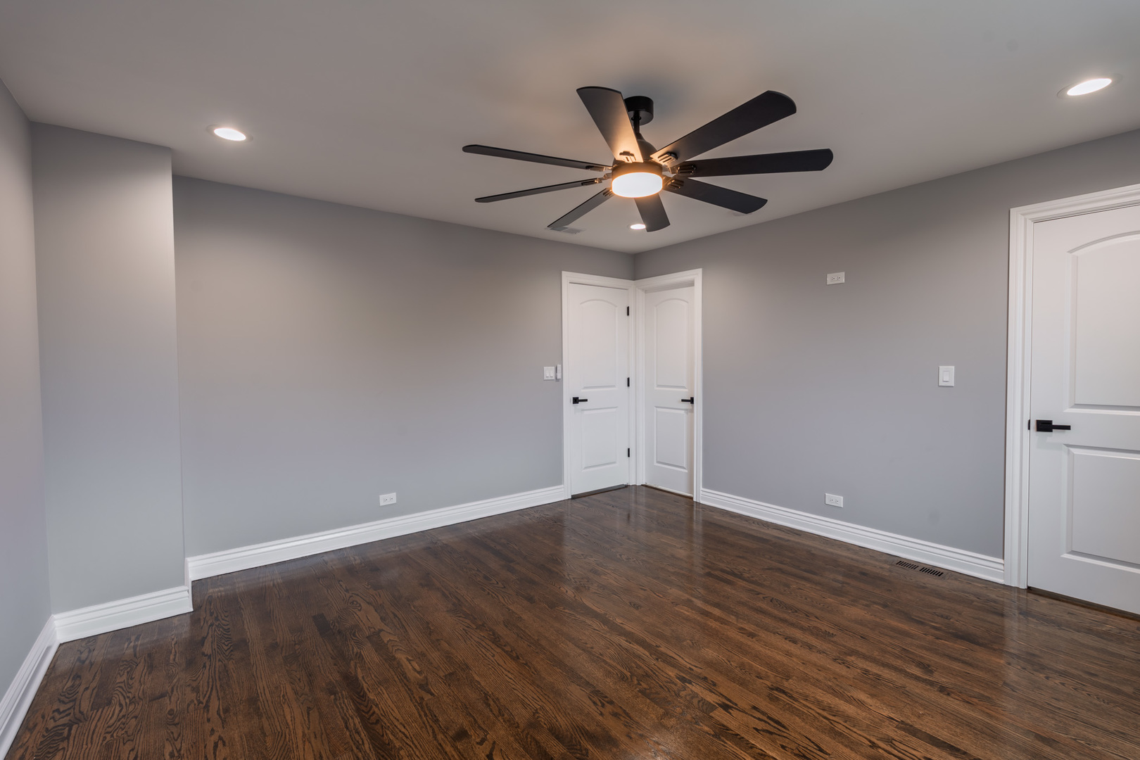 2252 Northgate Avenue North Riverside, IL 60546 - Photo 23 of 46 an empty room with wooden floor fan and windows