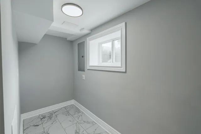 an empty room with windows