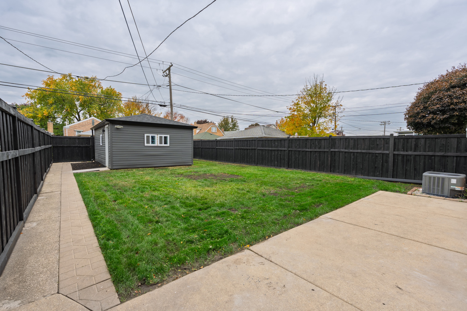 2252 Northgate Avenue North Riverside, IL 60546 - Photo 41 of 46 a view of a back yard with a wooden fence