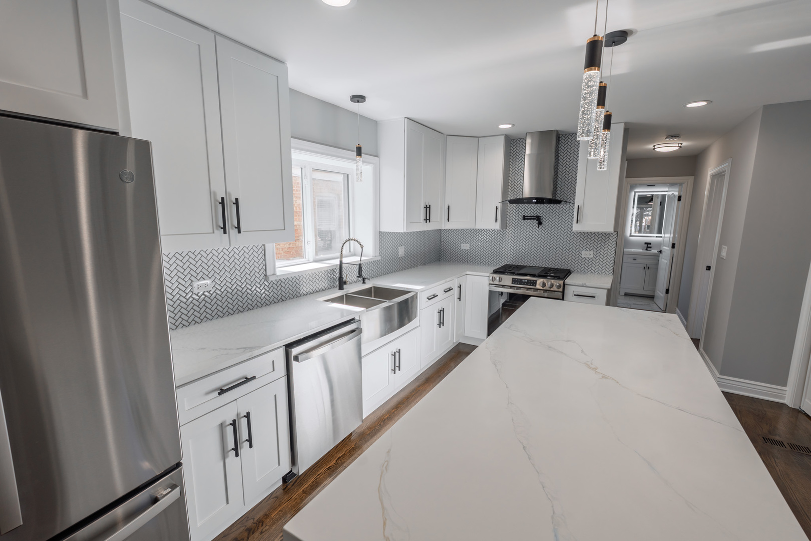 2252 Northgate Avenue North Riverside, IL 60546 - Photo 8 of 46 a large white kitchen with stainless steel appliances