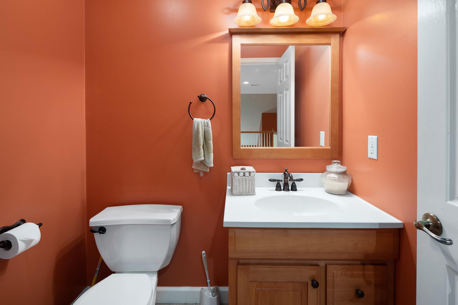 628 Rocky Valley Road Lebanon, TN 37090 - Photo 18 of 30 a bathroom with a toilet sink and mirror