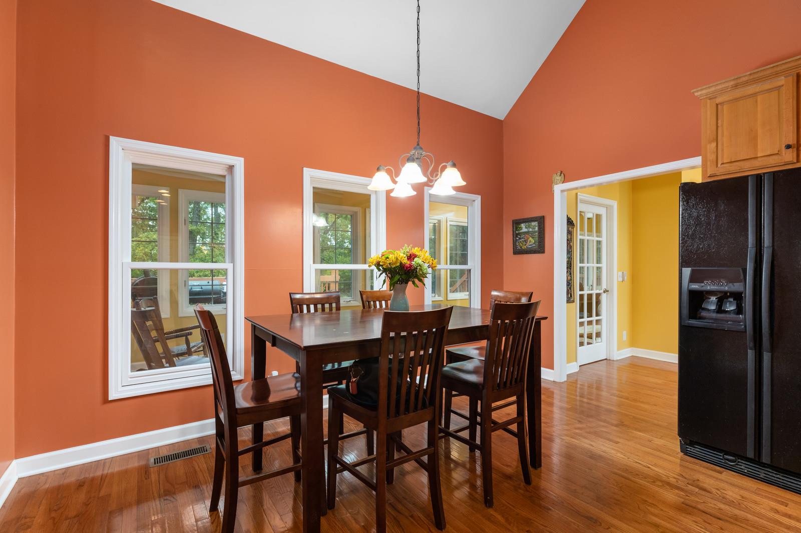 628 Rocky Valley Road Lebanon, TN 37090 - Photo 10 of 30 a view of a dining room with furniture and wooden floor
