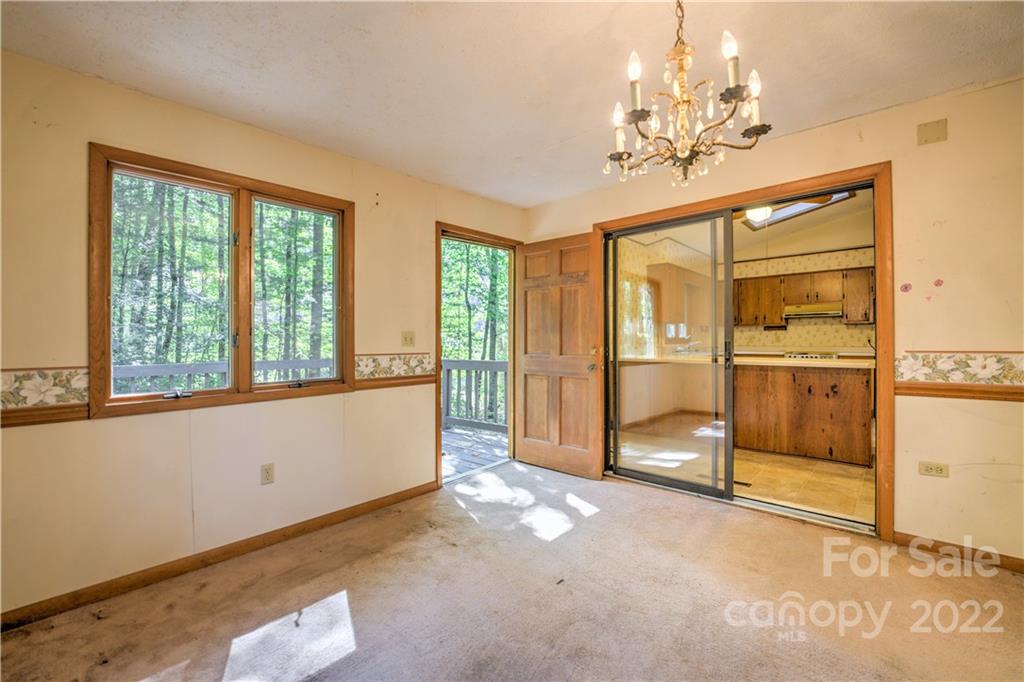 177 Weston Road Arden, NC 28704 - Photo 13 of 36 a view of an empty room with a window