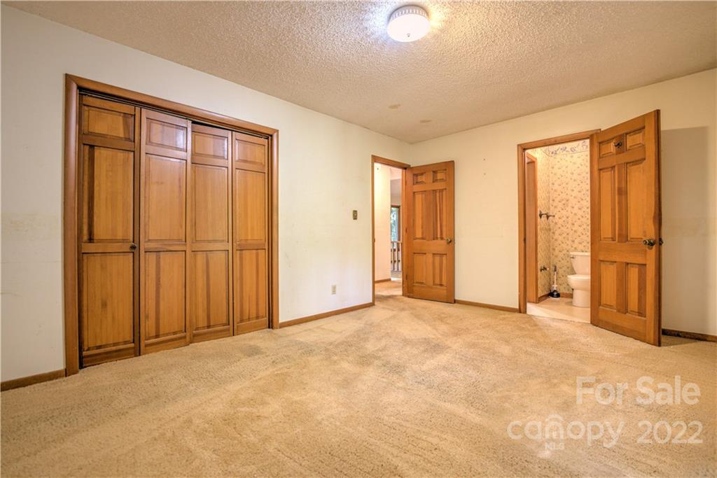 177 Weston Road Arden, NC 28704 - Photo 15 of 36 an empty room with a window