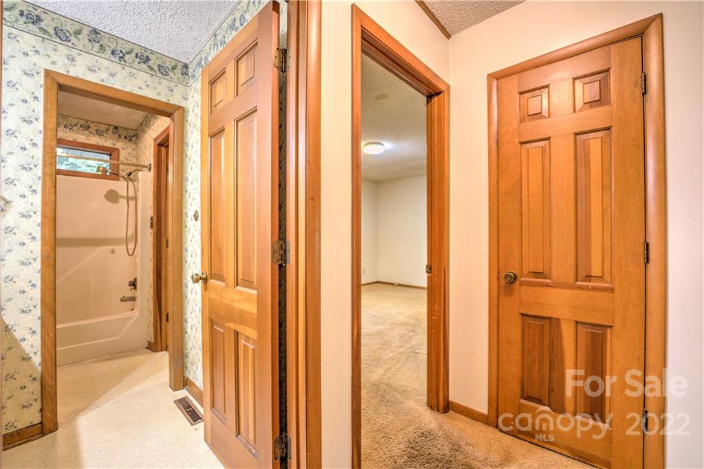 177 Weston Road Arden, NC 28704 - Photo 18 of 36 view of a bathroom with a glass door