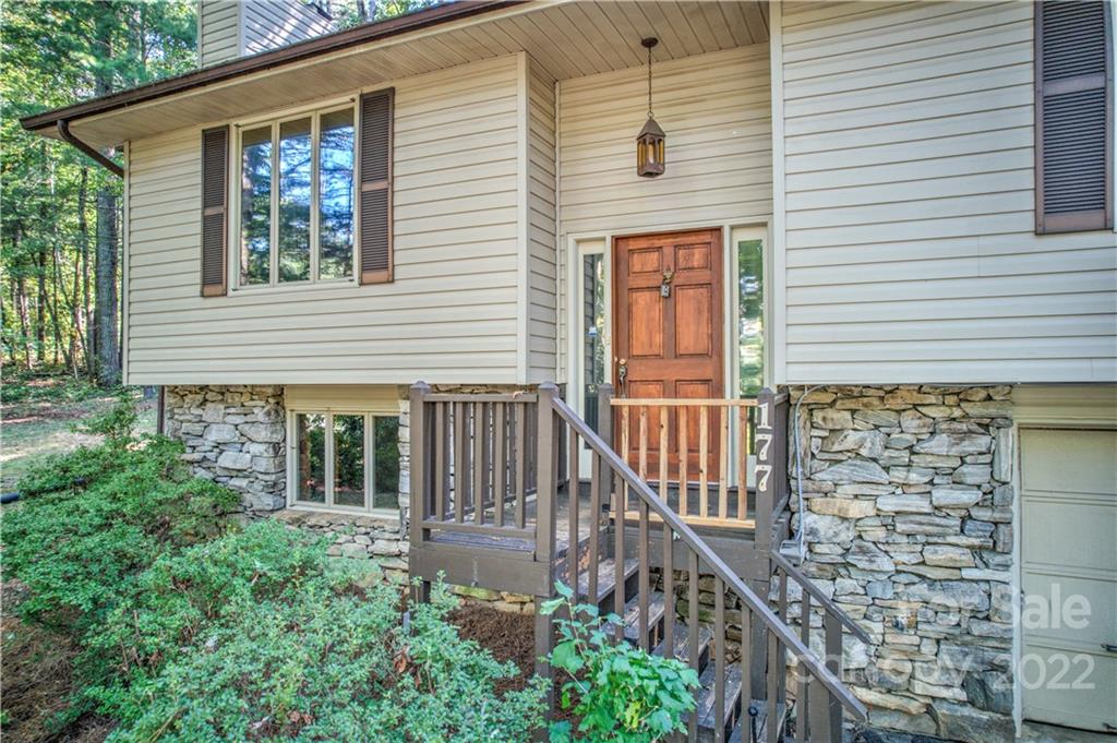 177 Weston Road Arden, NC 28704 - Photo 2 of 36 a front view of a house with balcony