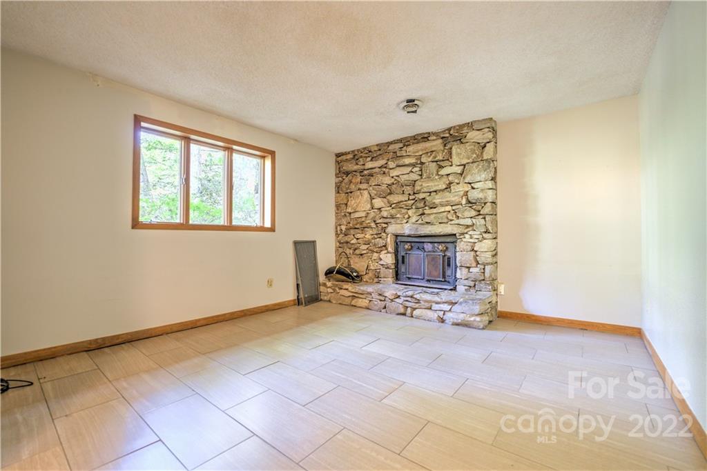 177 Weston Road Arden, NC 28704 - Photo 26 of 36 an empty room with windows