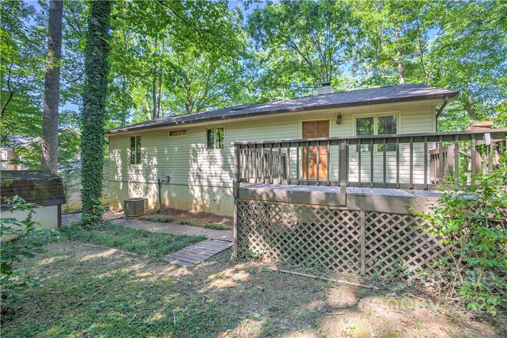 177 Weston Road Arden, NC 28704 - Photo 35 of 36 front view of a house with a garden