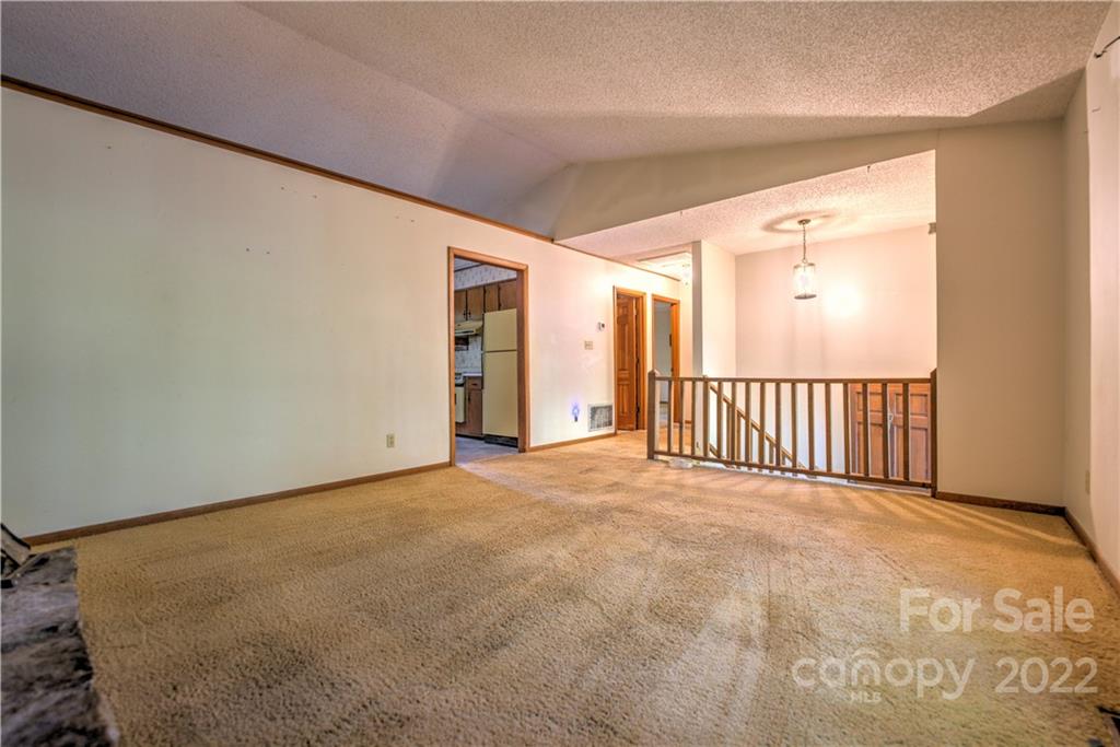 177 Weston Road Arden, NC 28704 - Photo 7 of 36 a view of an empty room with a window