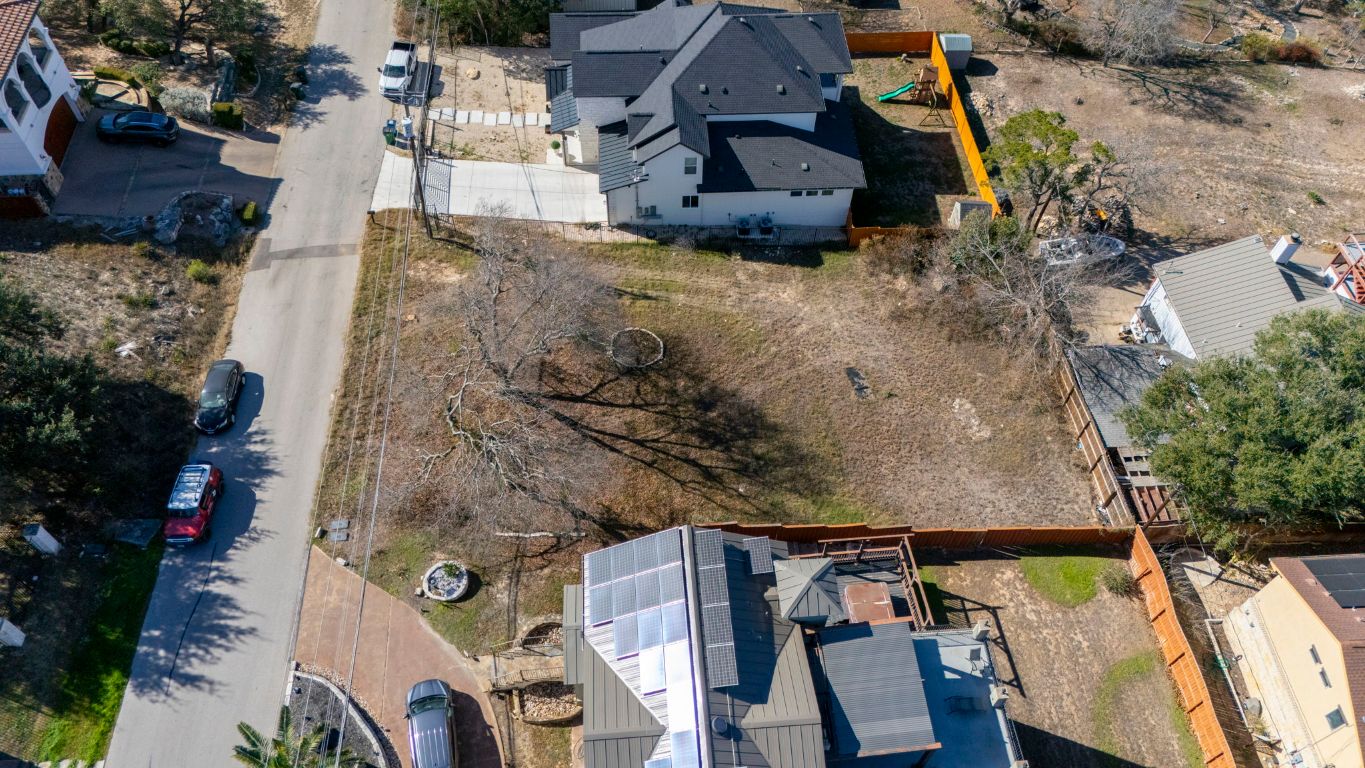 12802 Thomas Street Austin, TX 78732 - Photo 22 of 31 an aerial view of residential houses with outdoor space