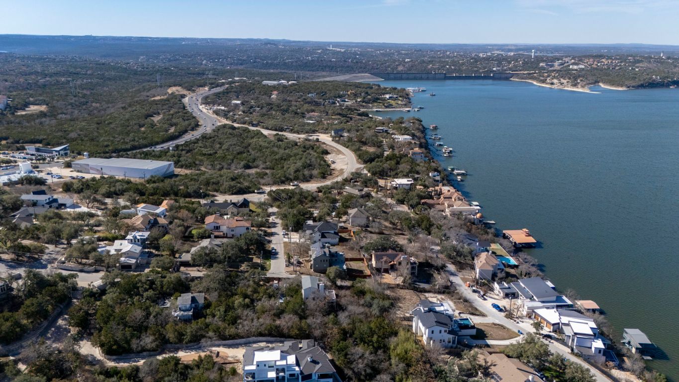 12802 Thomas Street Austin, TX 78732 - Photo 24 of 31 an aerial view of house with yard and ocean view