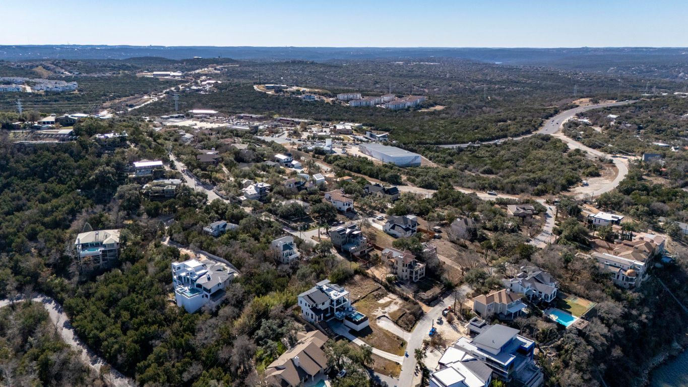 12802 Thomas Street Austin, TX 78732 - Photo 25 of 31 an aerial view of residential houses with city and green space