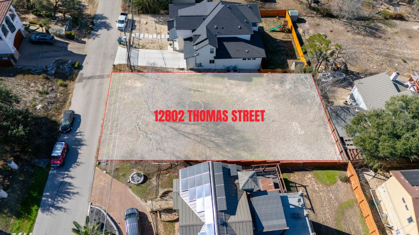 12802 Thomas Street Austin, TX 78732 - Photo 3 of 31 an aerial view of residential house with wooden fence