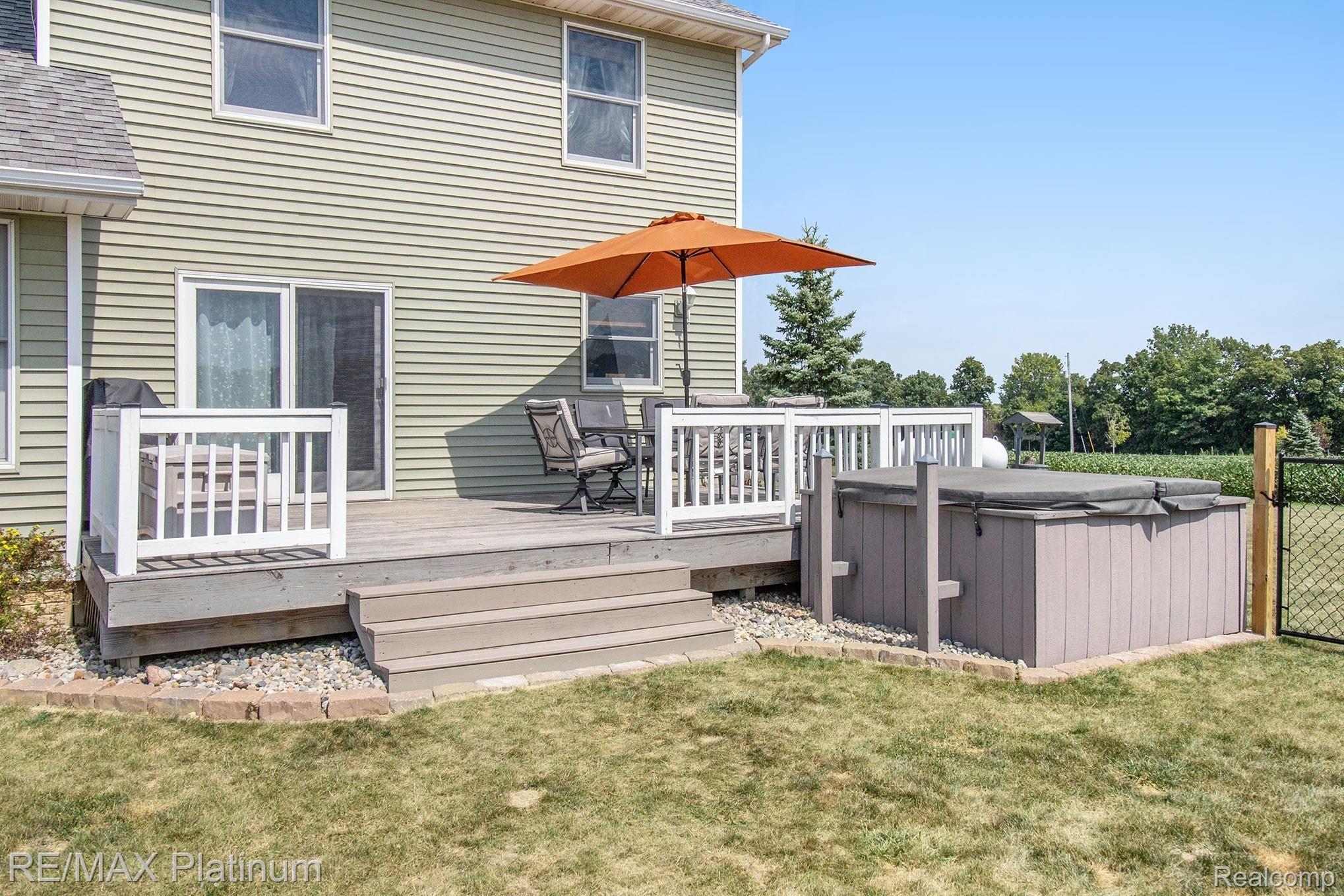 1356 East Bennington Road Owosso, MI 48867 - Photo 23 of 28 Back Deck with hot tub (included)