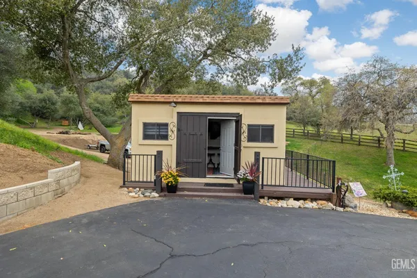 a view of a house with snow in the yard