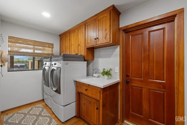 a kitchen with a sink and a refrigerator