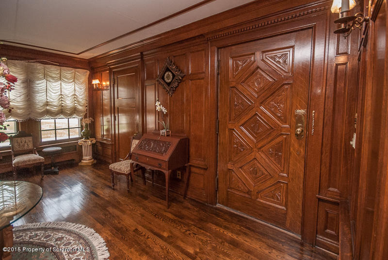 145 Carbondale Road Waverly, PA 18471 - Photo 11 of 98 a living room with furniture and a gate