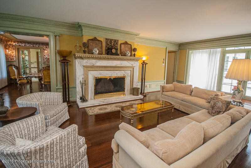 145 Carbondale Road Waverly, PA 18471 - Photo 15 of 98 a living room with furniture and a fireplace
