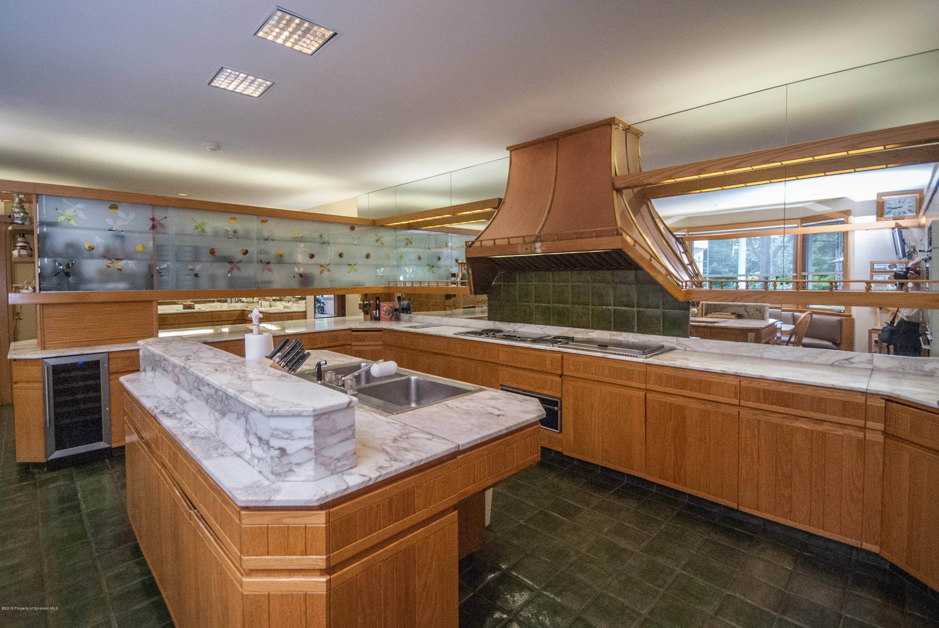 145 Carbondale Road Waverly, PA 18471 - Photo 38 of 98 a kitchen with stainless steel appliances granite countertop a sink and a stove