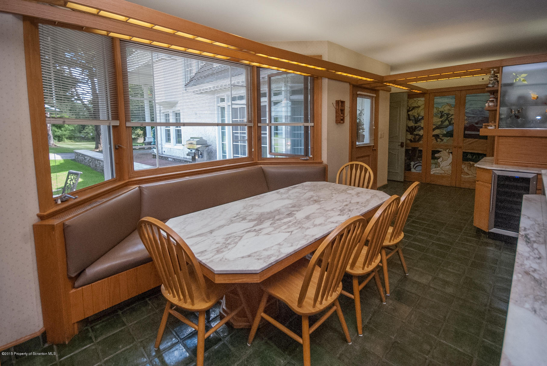 145 Carbondale Road Waverly, PA 18471 - Photo 39 of 98 a dining room with furniture and window