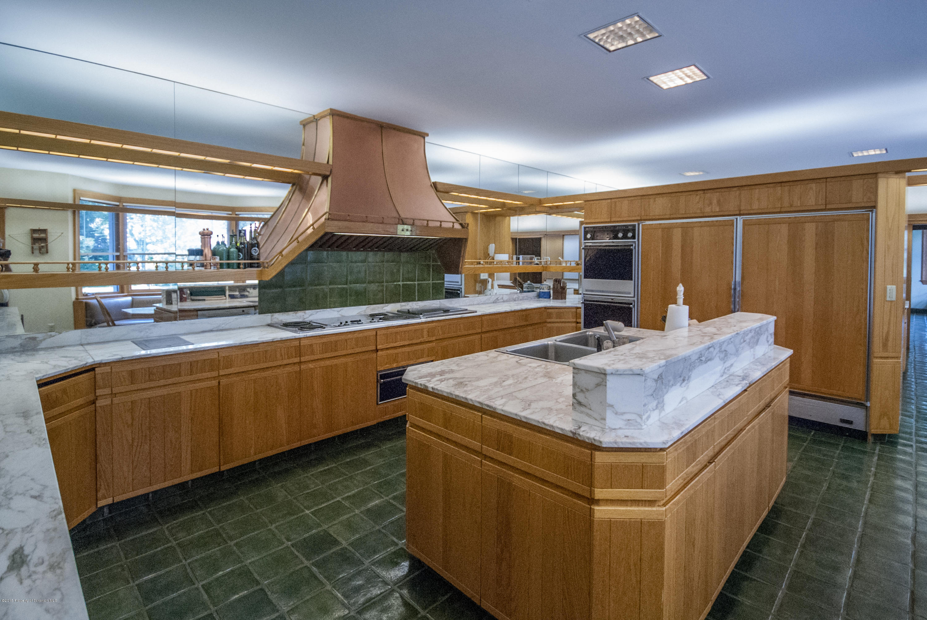 145 Carbondale Road Waverly, PA 18471 - Photo 41 of 98 a kitchen with stainless steel appliances granite countertop a sink and a stove