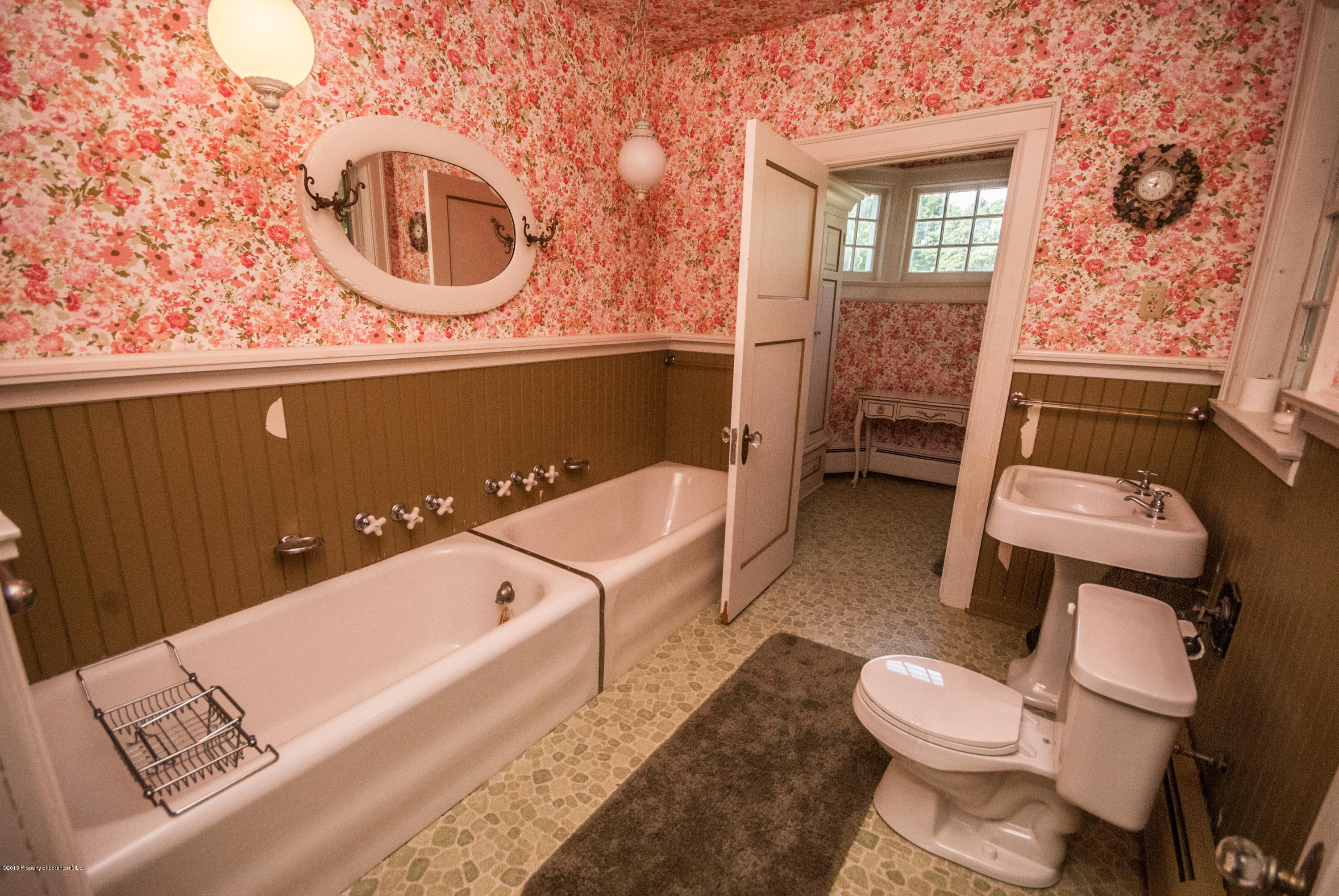 145 Carbondale Road Waverly, PA 18471 - Photo 69 of 98 a bathroom with a sink a toilet and bathtub