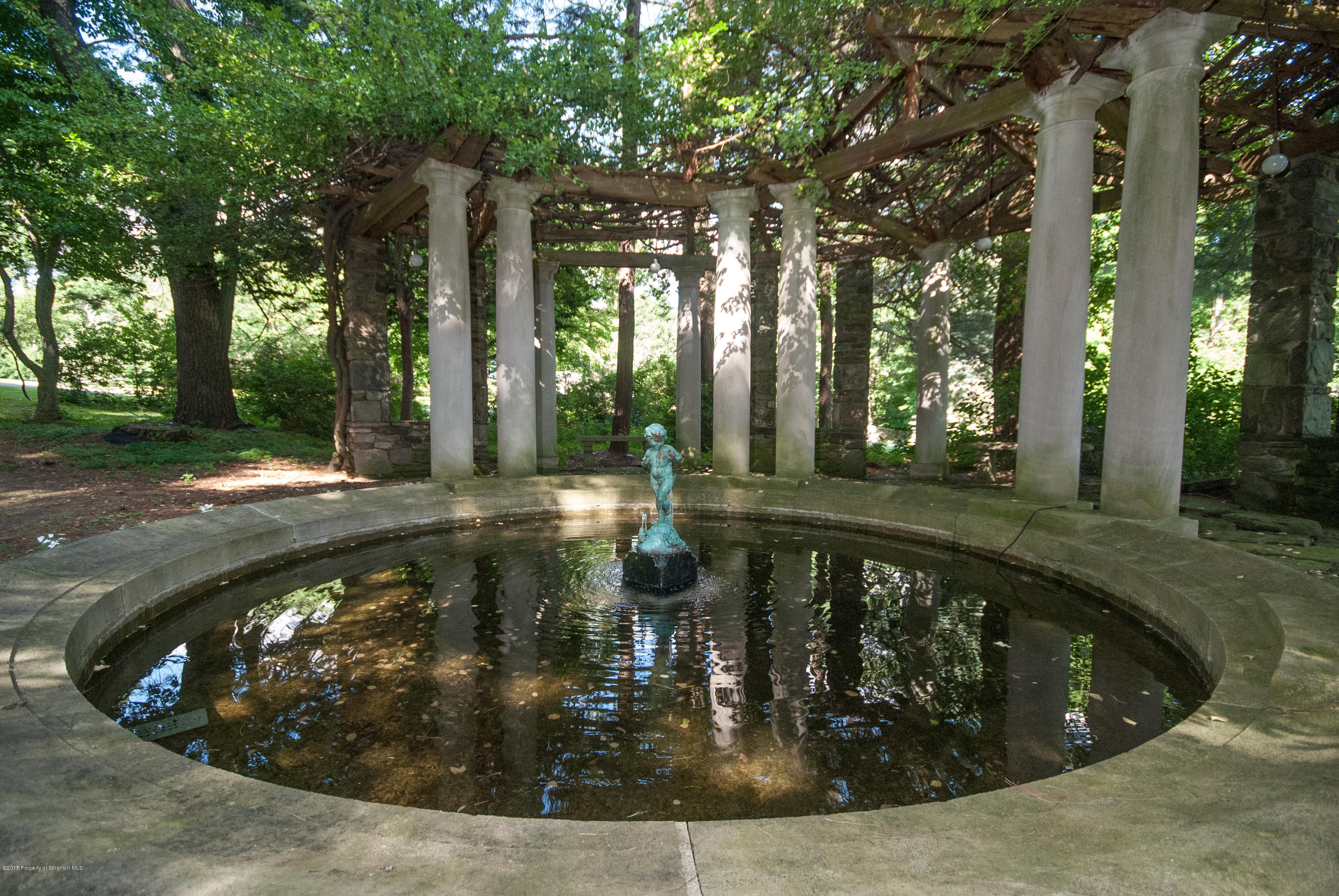 145 Carbondale Road Waverly, PA 18471 - Photo 7 of 98 a view of a swimming pool with a patio