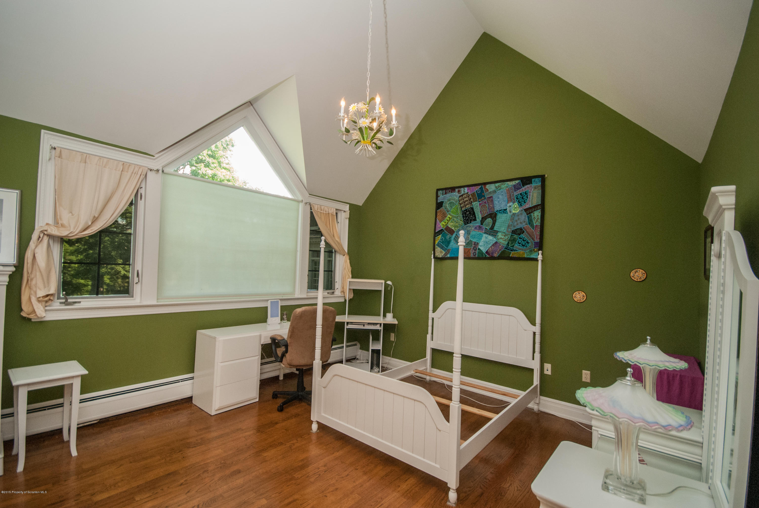 145 Carbondale Road Waverly, PA 18471 - Photo 73 of 98 a living room with furniture and a chandelier