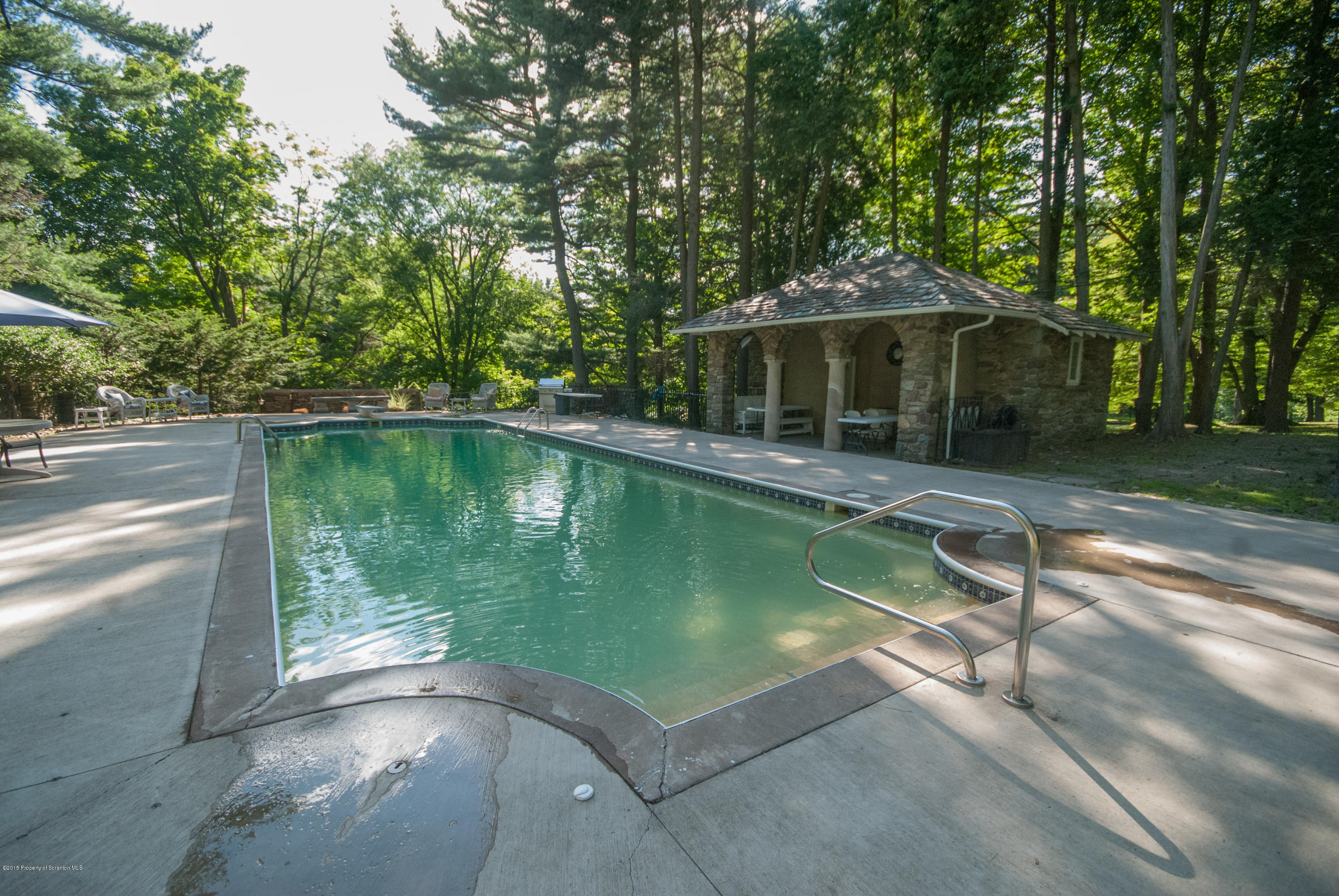 145 Carbondale Road Waverly, PA 18471 - Photo 86 of 98 a view of a swimming pool with a patio