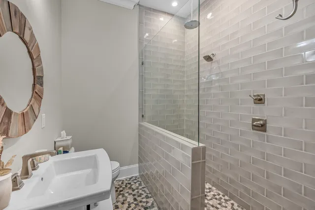 a view of a hallway with a chandelier