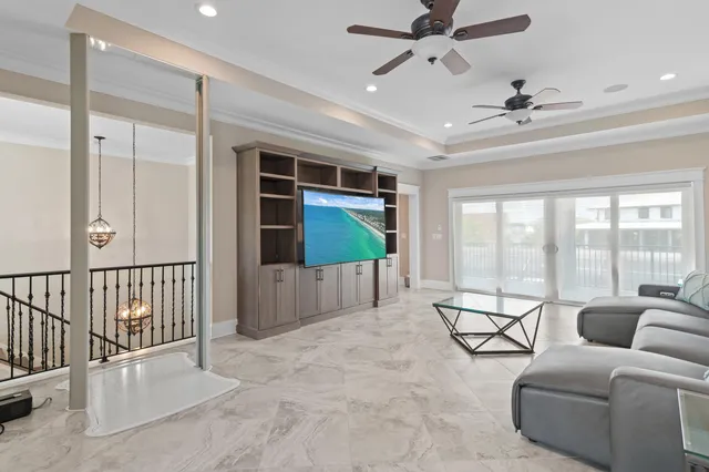 a kitchen with stainless steel appliances granite countertop white cabinets and a sink