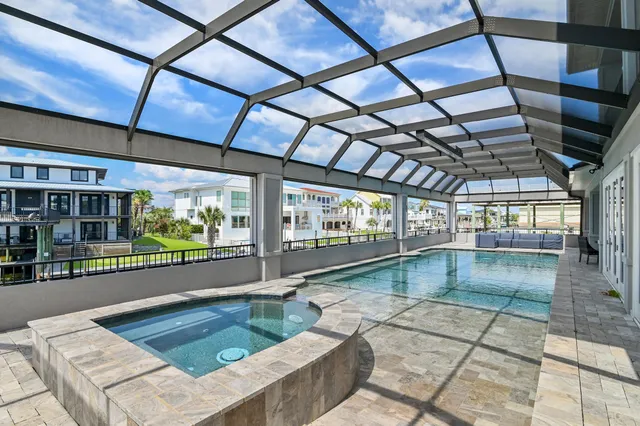 a patio with yard table and chairs