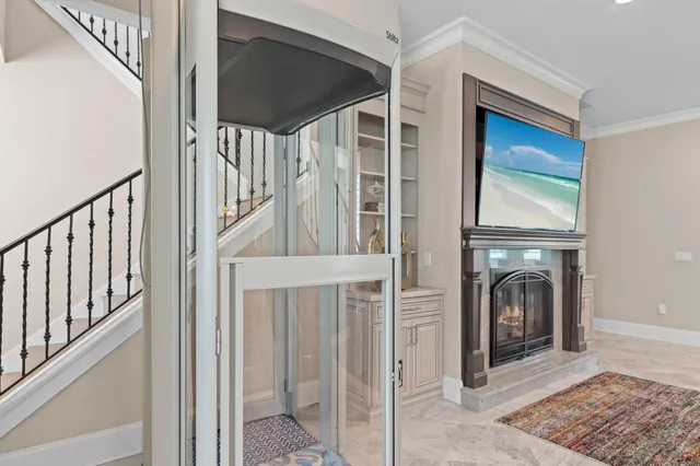 a view of a hallway with a washer and dryer