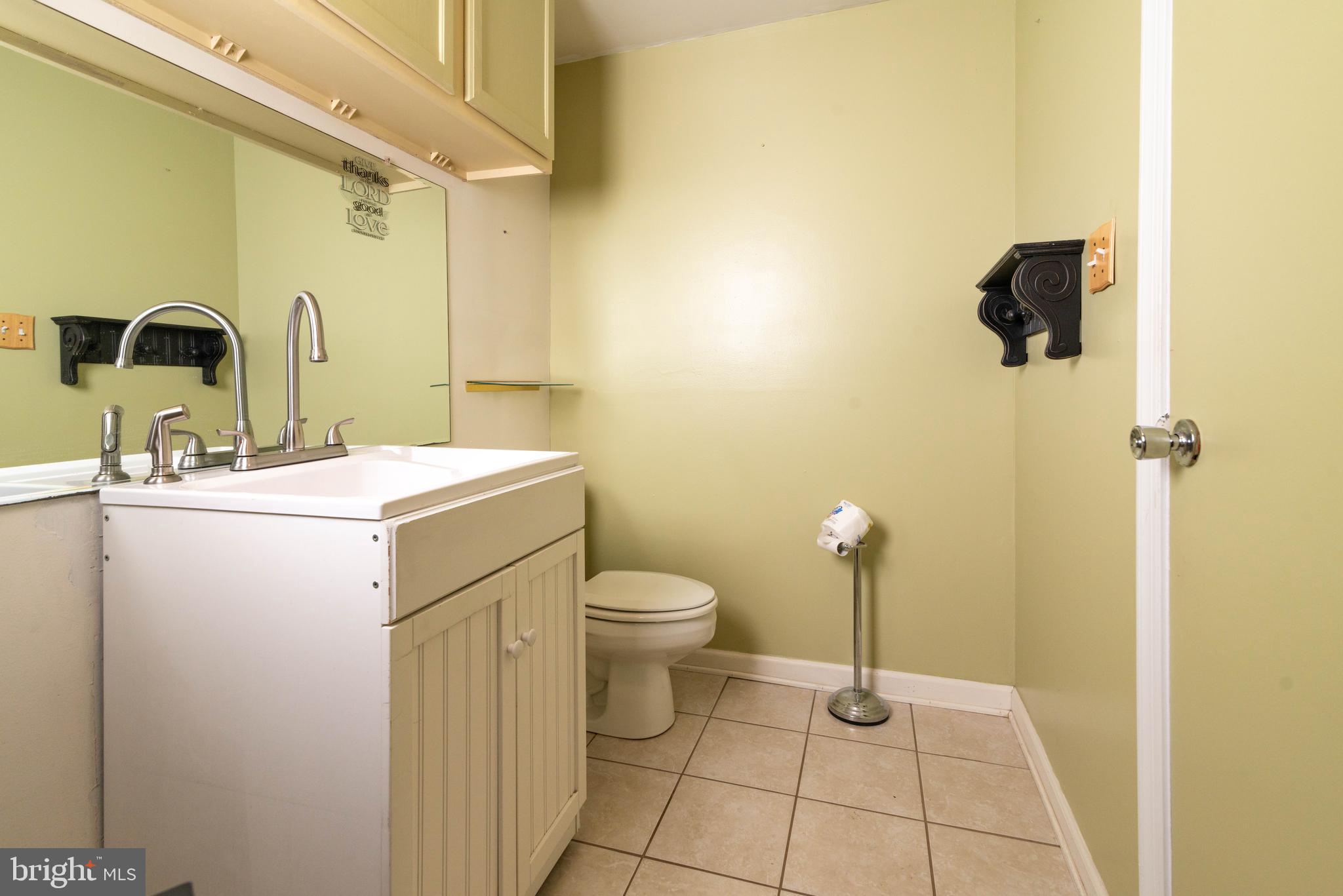 106 South Shady Retreat Road Doylestown, PA 18901 - Photo 18 of 33 a bathroom with a sink a toilet and shower