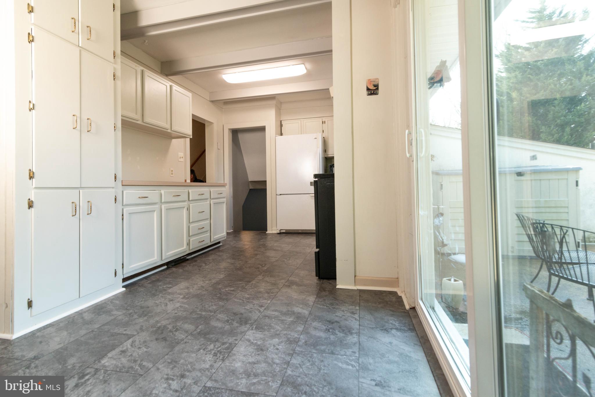 106 South Shady Retreat Road Doylestown, PA 18901 - Photo 4 of 33 a view of a kitchen with refrigerator
