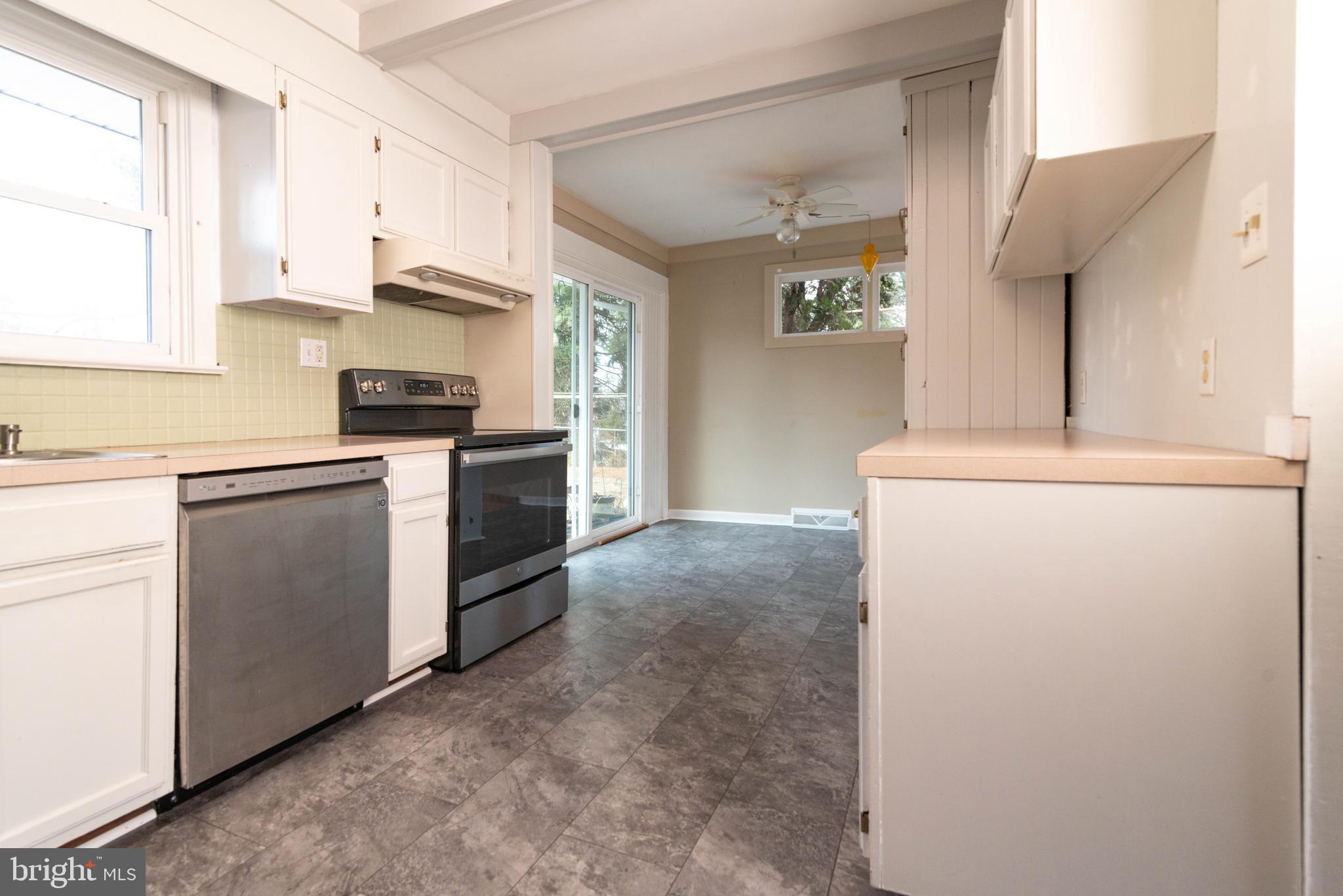 106 South Shady Retreat Road Doylestown, PA 18901 - Photo 5 of 33 a kitchen with cabinets stainless steel appliances and counter space