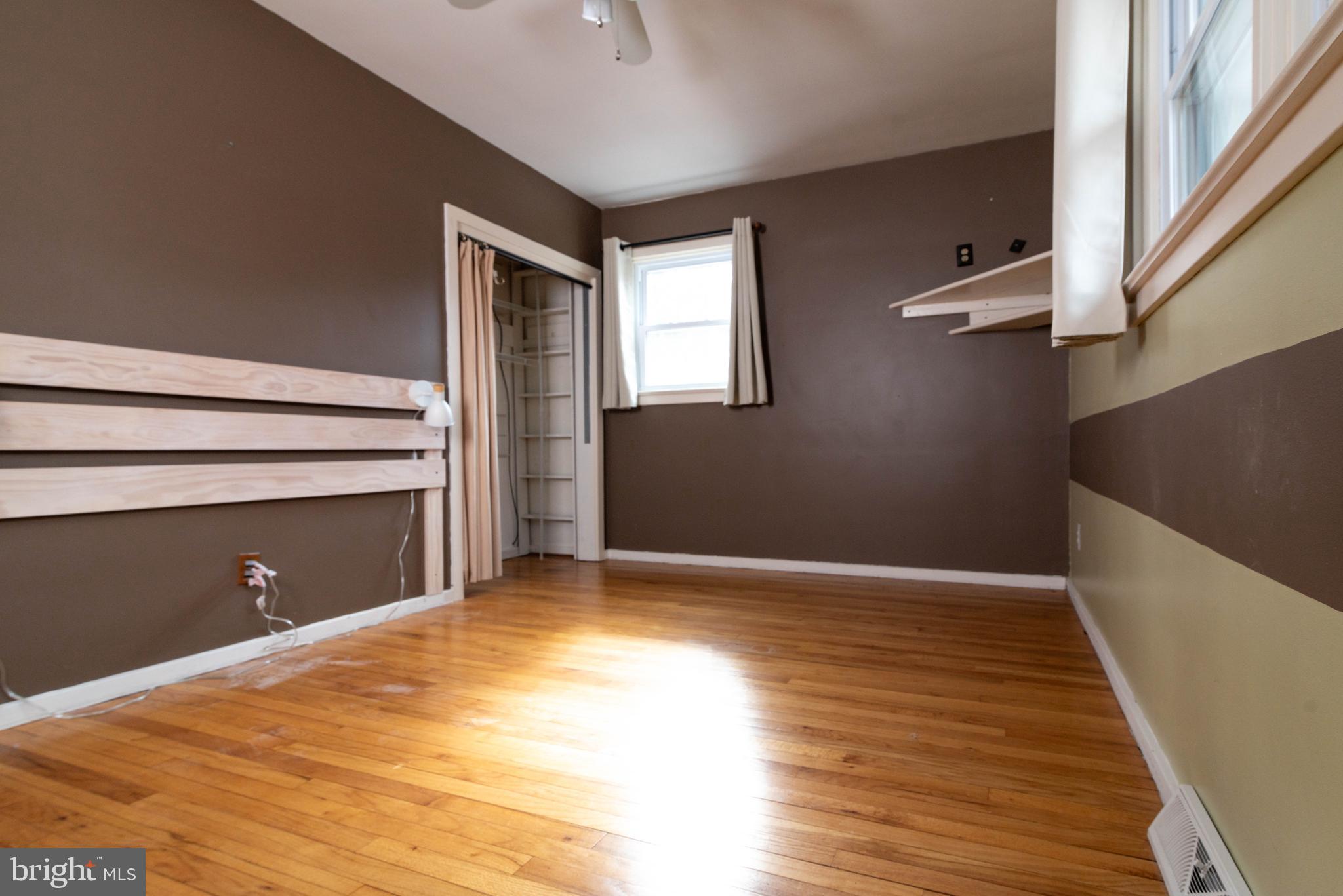 106 South Shady Retreat Road Doylestown, PA 18901 - Photo 10 of 33 a view of an empty room with wooden floor and a window