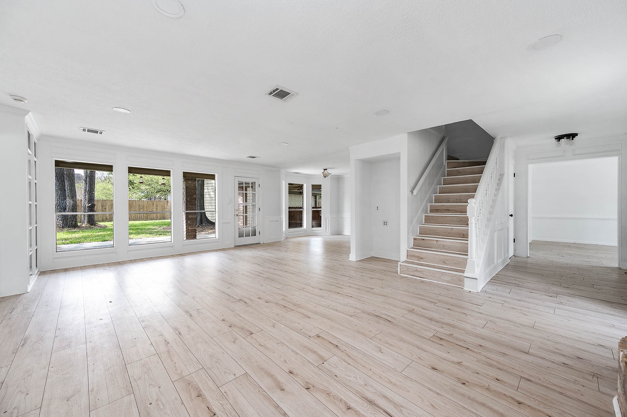 17627 Terrawren Lane Spring, TX 77379 - Photo 7 of 30 wooden floor in an empty room with a window