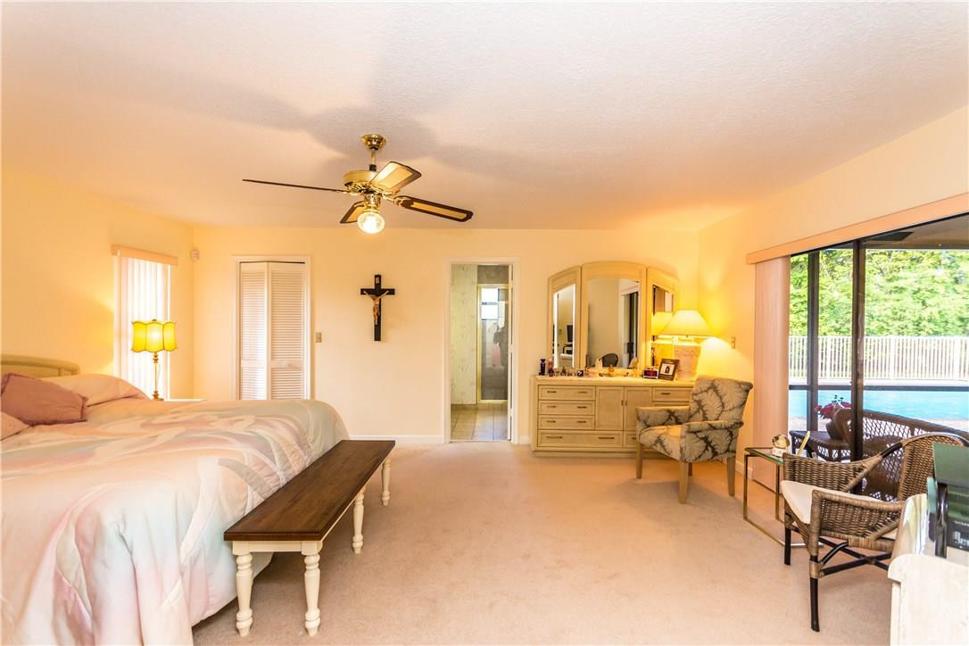 22870 Greenview Terrace Boca Raton, FL 33433 - Photo 13 of 57 a living room with furniture and a large window