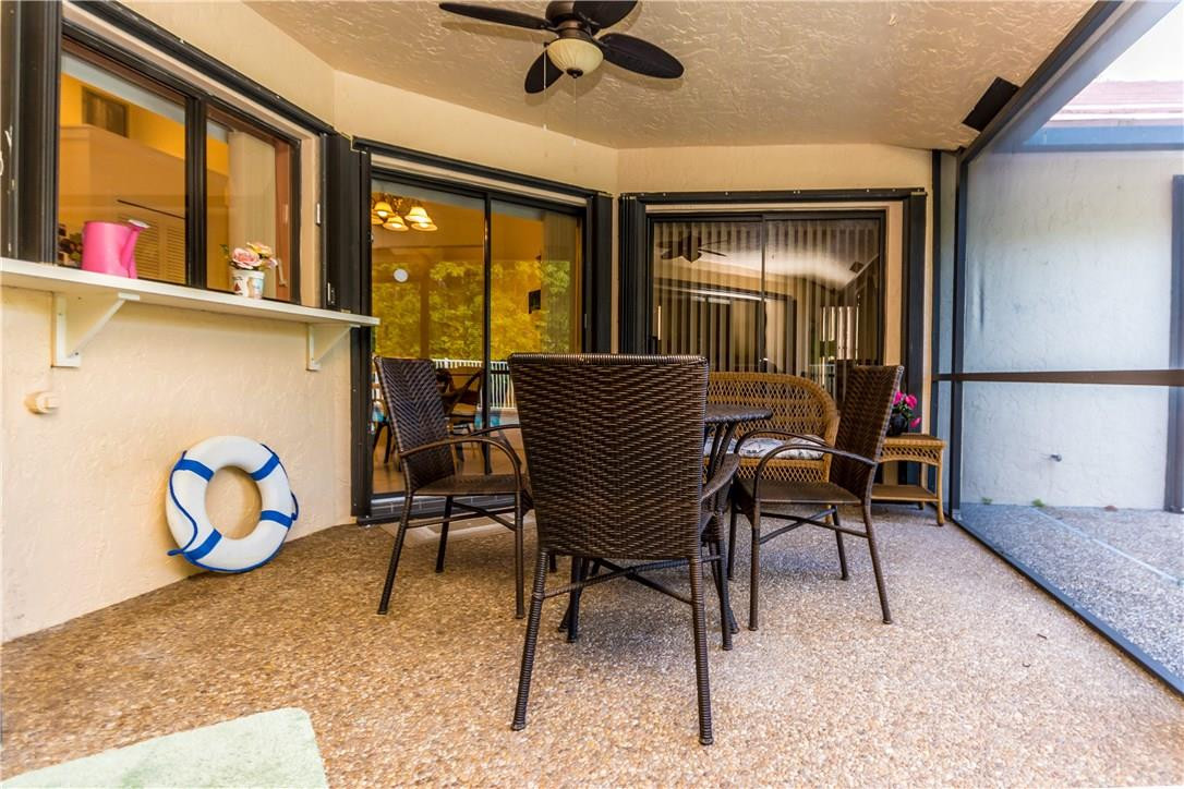 22870 Greenview Terrace Boca Raton, FL 33433 - Photo 16 of 57 a dining room with furniture and a window