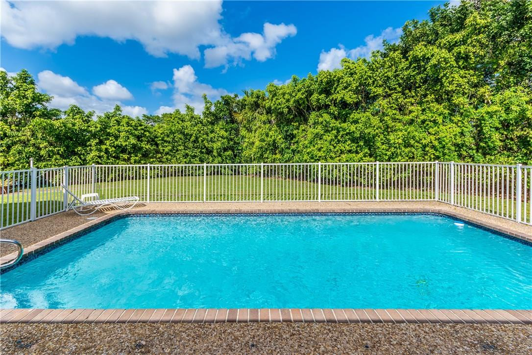 22870 Greenview Terrace Boca Raton, FL 33433 - Photo 18 of 57 a view of a yard with a large trees