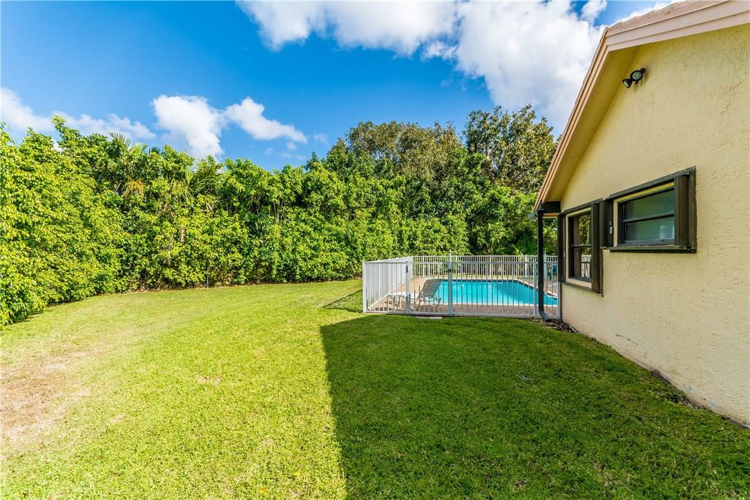 22870 Greenview Terrace Boca Raton, FL 33433 - Photo 19 of 57 a view of a back yard