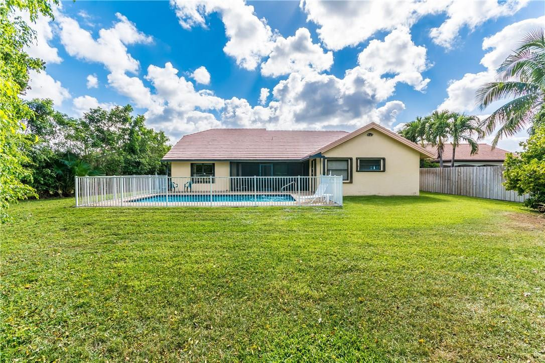 22870 Greenview Terrace Boca Raton, FL 33433 - Photo 22 of 57 a front view of a house with garden