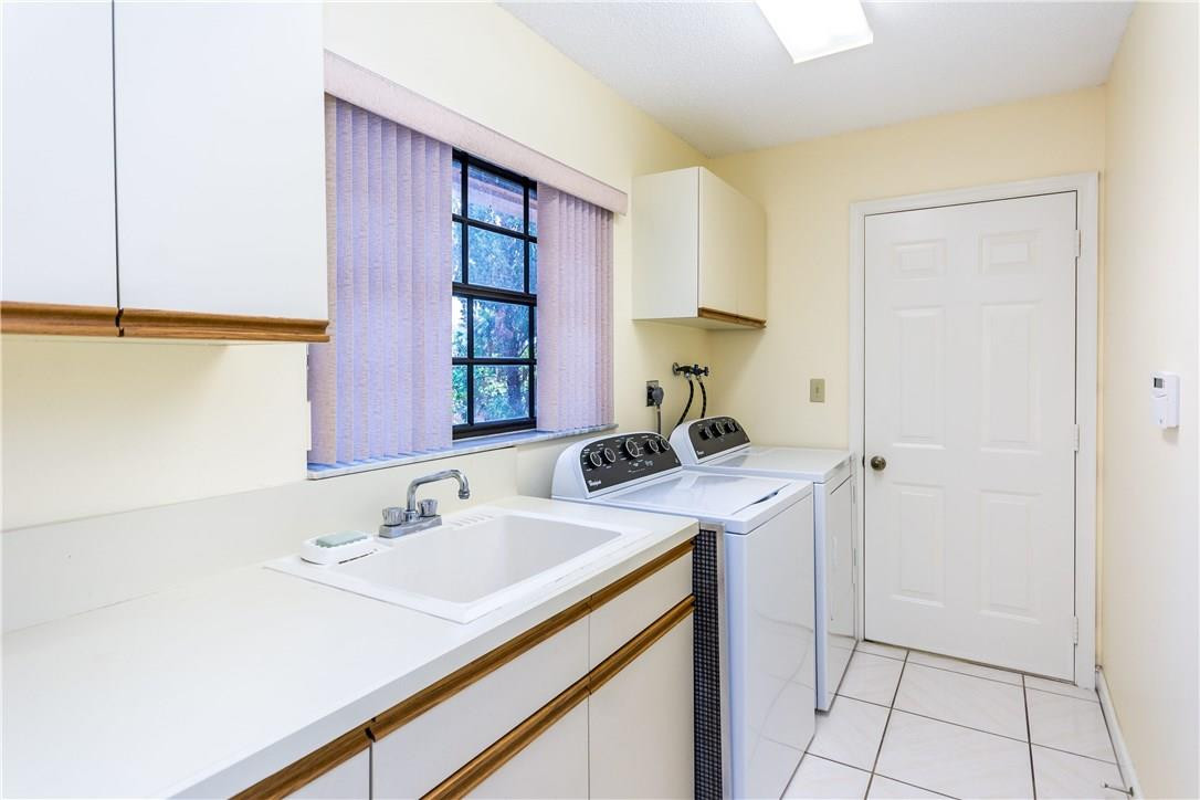 22870 Greenview Terrace Boca Raton, FL 33433 - Photo 35 of 57 a bathroom with a sink and a mirror